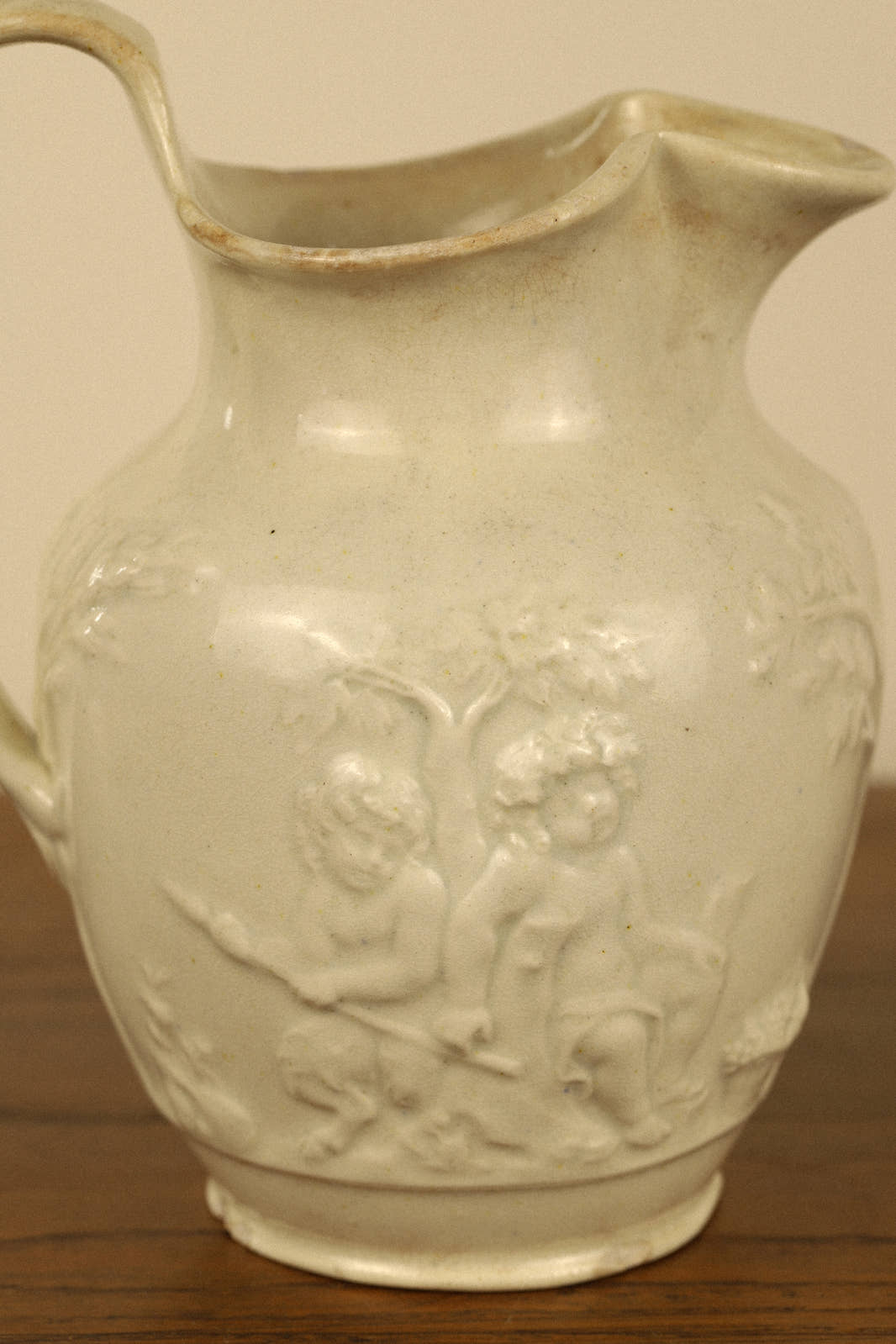 Antique 19th Century Cherub Relief Pitcher