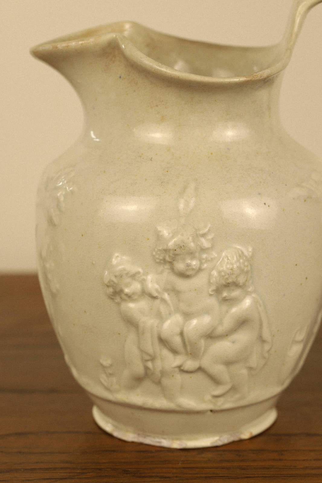 Antique 19th Century Cherub Relief Pitcher